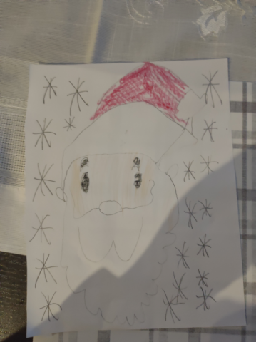 Portret Świętego Mikołaja narysowany przez ucznia