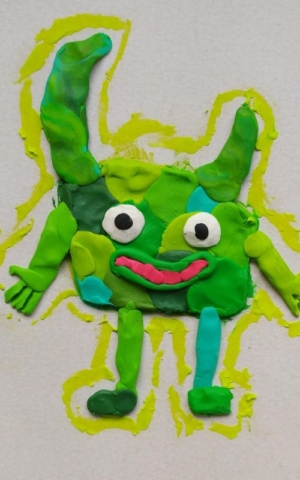Płaskorzeźba z plasteliny przedstawiająca miłego potwora