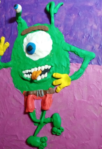 Płaskorzeźba z plasteliny przedstawiająca miłego potwora